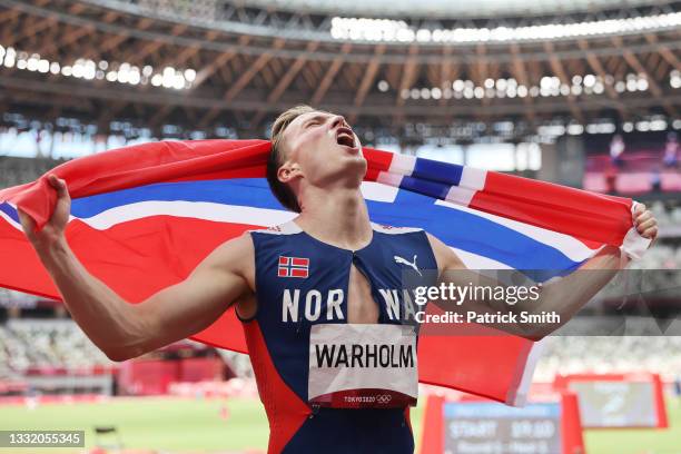 Karsten Warholm of Team Norway reacts after winning the gold medal in the Men's 400m Hurdles Final on day eleven of the Tokyo 2020 Olympic Games at...