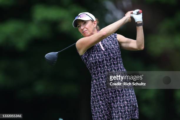 Kris Tschetter of the United States hits her tee shot on the 13th hole during the final round of the 2021 U.S. Senior Women's Open at Brooklawn...
