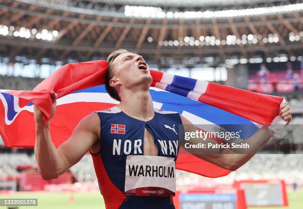 Karsten Warholm of Team Norway reacts after winning the gold medal in the Men's 400m Hurdles Final on day eleven of the Tokyo 2020 Olympic Games at...