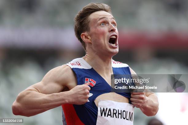 Karsten Warholm of Team Norway reacts after winning the gold medal in the Men's 400m Hurdles Final on day eleven of the Tokyo 2020 Olympic Games at...