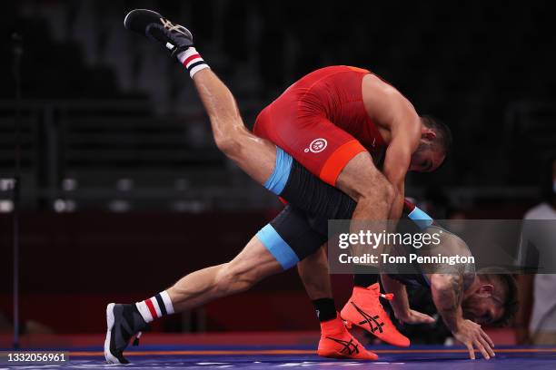 Parviz Nasibov of Team Ukraine competes against Fredrik Holmquist Bjerrehuus of Team Denmark during the Men's Greco-Roman 67kg 1/8 Final on day...