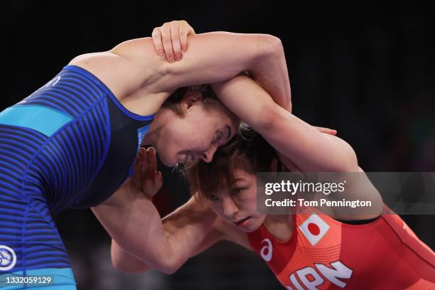 Yukako Kawai of Team Japan competes against Henna Katarina Johansson of Team Sweden during the Women's Freestyle 62kg Quarter Final on day eleven of...