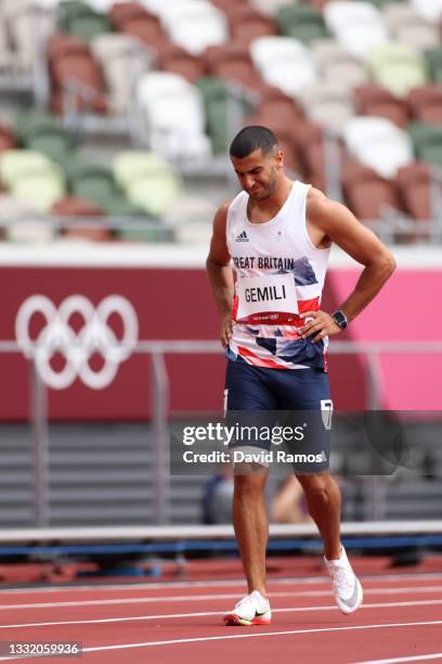 Adam Gemili of Team Great Britain walks during round one of the Men's 200m heats after an apparent injury on day eleven of the Tokyo 2020 Olympic...