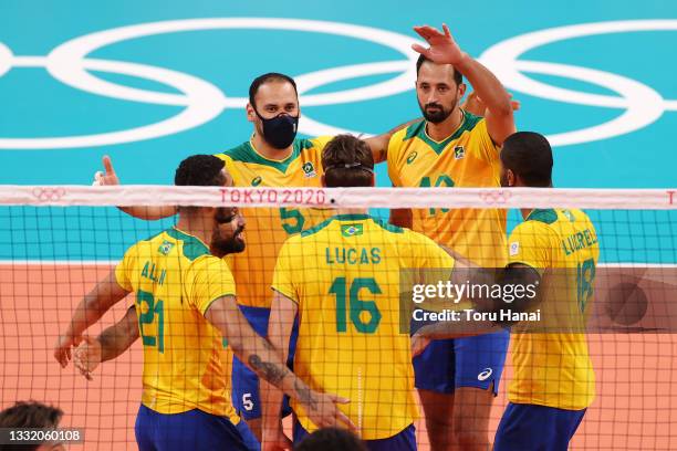 Team Brazil celebrates after the play against Team Japan during the Men's Quarterfinals volleyball on day eleven of the Tokyo 2020 Olympic Games at...