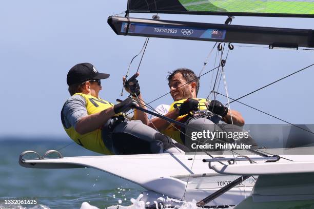 Peter Burling and Blair Tuke of Team New Zealand compete in the Men's Skiff 49er class medal race on day eleven of the Tokyo 2020 Olympic Games at...