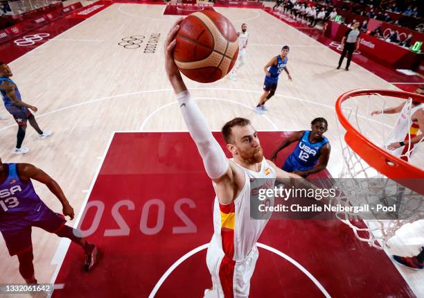 Victor Claver of Team Spain goes up for a shot against United States during the first half of a Men's Basketball Quarterfinal game on day eleven of...