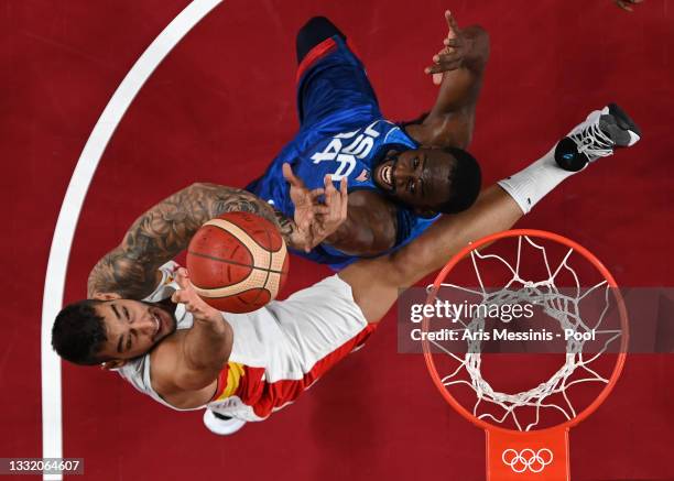 Willy Hernangomez of Team Spain drives to the basket against Draymond Green of Team United States during the first half of a Men's Basketball...