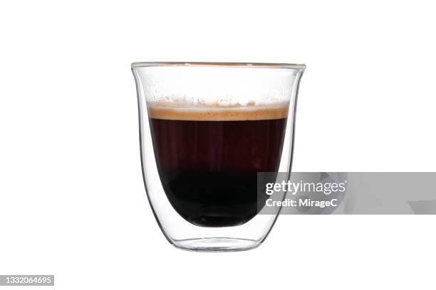 black coffee in layered glass cup on white - americano stockfoto's en -beelden