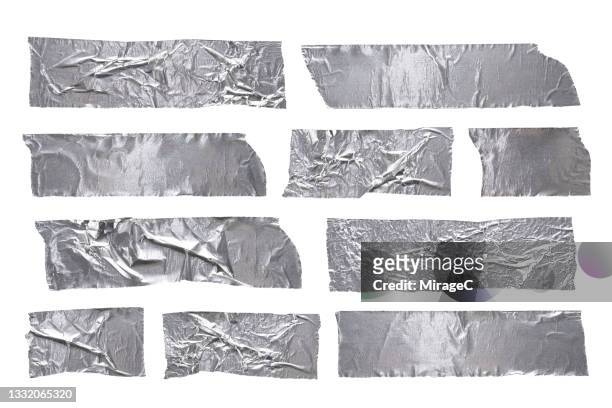 aluminum foil adhesive tape isolated on white - papel de alumínio - fotografias e filmes do acervo