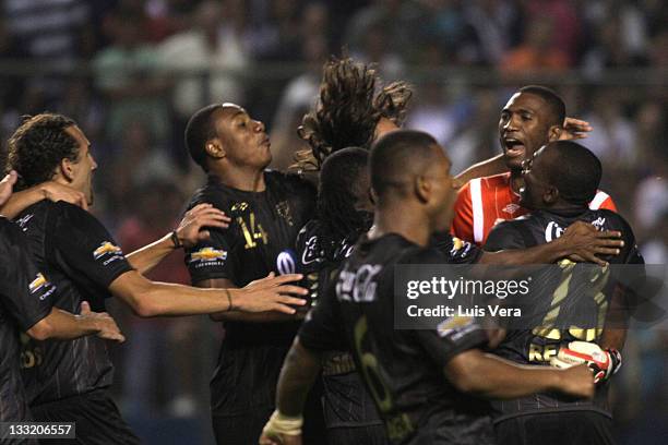 Players from Liga Universitaria de Quito, celebrates to win the game during a match between Liga Universitaria de Quito of Ecuador and Libertad of...