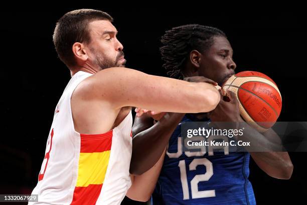 Marc Gasol of Team Spain knocks the ball away from Jrue Holiday of Team United States during the second half of a Men's Basketball Quarterfinal game...