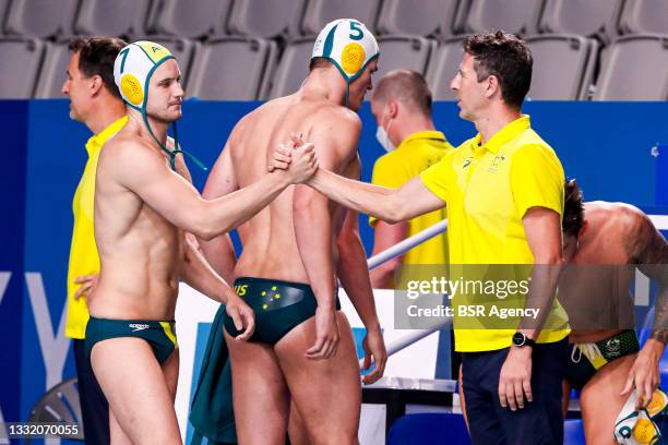 Aidan Roach of Australia, Head Coach Elvis Fatovic of Australia during the Tokyo 2020 Olympic Waterpolo Tournament Men match between Team Australia...