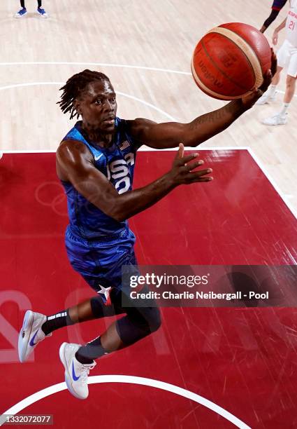 Jrue Holiday of Team United States drives to the basket against Team Spain during the second half of a Men's Basketball Quarterfinal game on day...