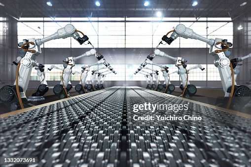 Robotic arm in assembly manufacturing factory Robotic arm in assembly manufacturing factory