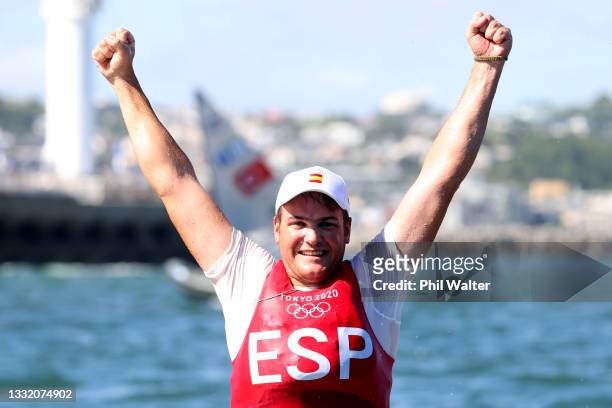 Bronze medalist Joan Cardona Mendez of Team Spain celebrates following the Men's Finn class medal race on day eleven of the Tokyo 2020 Olympic Games...