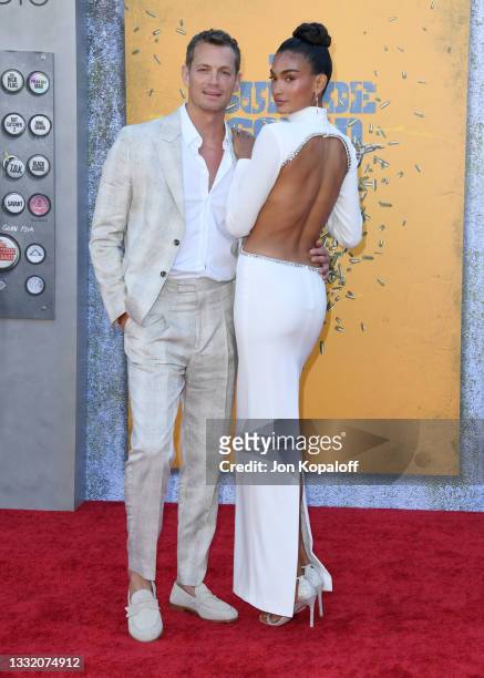 Joel Kinnaman and Kelly Gale attend Warner Bros. Premiere Of "The Suicide Squad" at The Landmark Westwood on August 02, 2021 in Los Angeles,...
