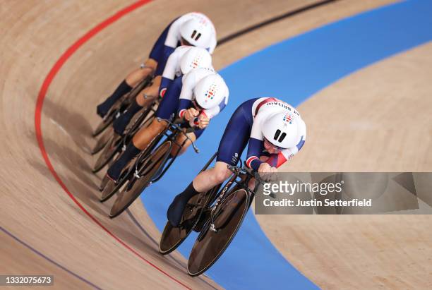 Katie Archibald of Team Great Britain and teammates sprint to set a new Olympic record during the Women's team pursuit first round, heat 3 of the...
