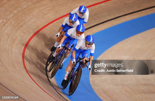 Rachele Barbieri of Team Italy and teammates sprint during the Women's team pursuit first round, heat 4 of the Track Cycling on day eleven of the...