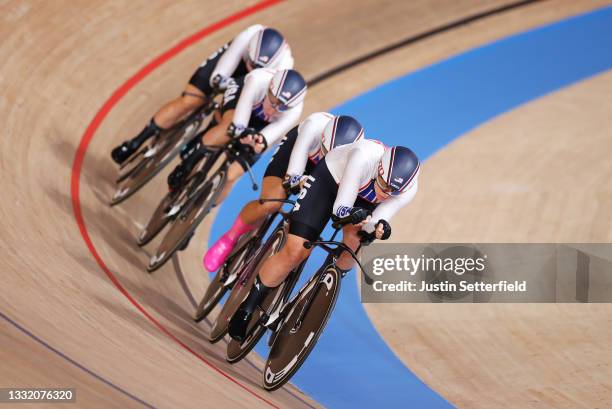 Emma White of Team United States and teammates sprint during the Women's team pursuit first round, heat 3 of the Track Cycling on day eleven of the...