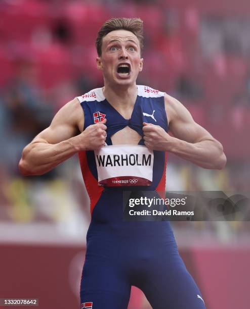 Karsten Warholm of Team Norway reacts after winning the gold medal in the Men's 400m Hurdles Final on day eleven of the Tokyo 2020 Olympic Games at...