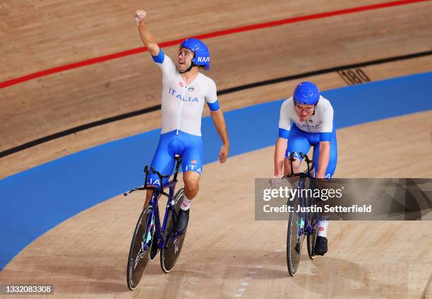 Francesco Lamon and Simone Consonni of Team Italy celebrate to setting a new Olympic record ahead of Team Australia during the Men´s team pursuit...