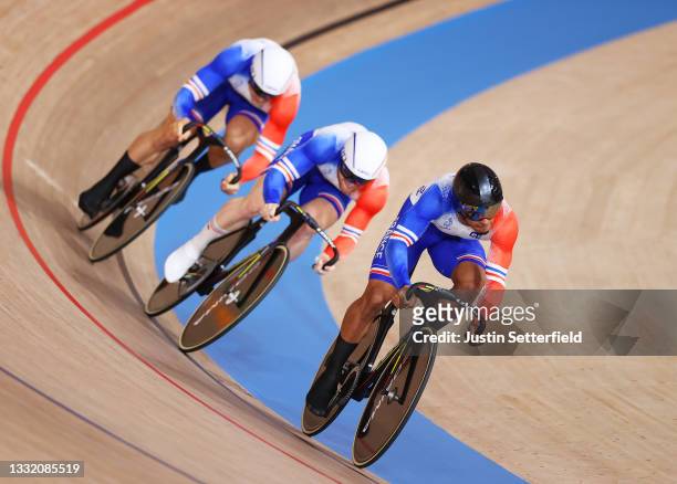 Florian Grengbo, Sebastien Vigier and Rayan Helal of Team France sprint during the Men´s team sprint first round, heat 1 of the Track Cycling on day...
