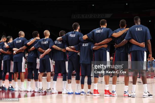 Team France lines up for the National Anthem before their game against Team Italy in Men's Basketball Quarterfinal action on day eleven of the Tokyo...