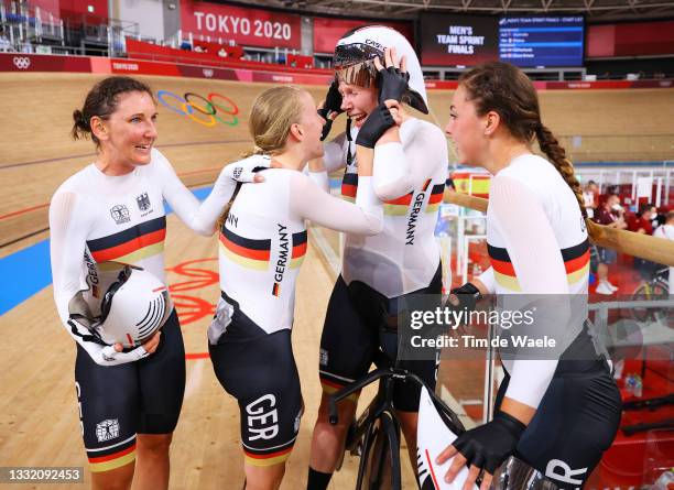 Lisa Brennauer, Franziska Brausse, Mieke Kroeger and Lisa Klein of Team Germany celebrate winning a gold medal during the Women's team pursuit...