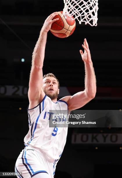 Nicolo Melli of Team Italy drives to the basket against Team France during the first half of a Men's Basketball Quarterfinal game on day eleven of...