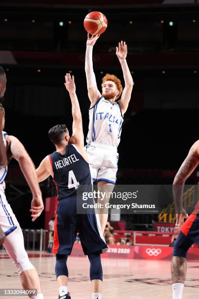 Niccolo Mannion of Team Italy shoots over Thomas Heurtel of Team France during the first half of a Men's Basketball Quarterfinal game on day eleven...