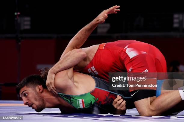 Ramaz Zoidze of Team Georgia competes against Mohammadreza Geraei of Team Iran during the Men's Greco-Roman 67kg Semi Final on day eleven of the...