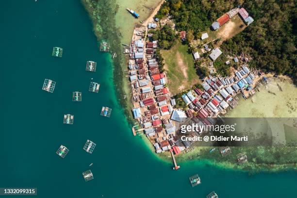 top down view of the boleng village in flores in indoneisa. - flores indonesia stock pictures, royalty-free photos & images