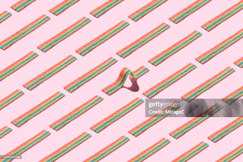 Curved Striped Candy Standing Out Form the Crowd