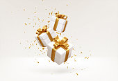Merry New Year and Merry Christmas 2022 white gift boxes with golden bows and gold sequins confetti on white background. Gift boxes flying and falling. Vector illustration
