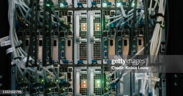 shot of an empty server room - hard drive stockfoto's en -beelden
