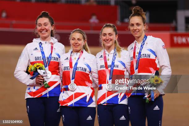 Silver medalist Katie Archibald, Neah Evans, Laura Kenny and Josie Knight of Team Great Britain, pose on the podium during the medal ceremony after...