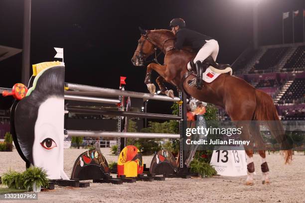 Yaofeng Li of Team China riding Jericho Dwerse Hagen competes during the Jumping Individual Qualifier on day eleven of the Tokyo 2020 Olympic Games...