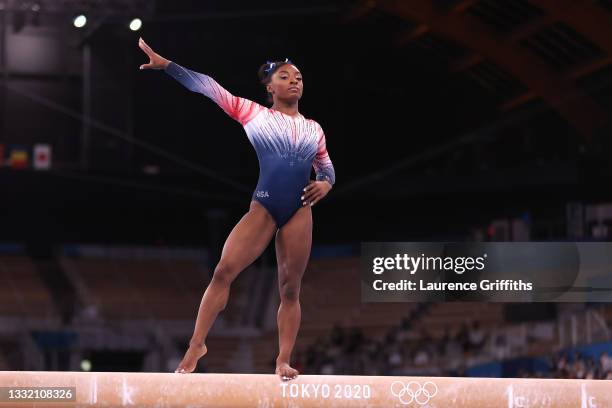 Simone Biles of Team United States competes in the Women's Balance Beam Final on day eleven of the Tokyo 2020 Olympic Games at Ariake Gymnastics...