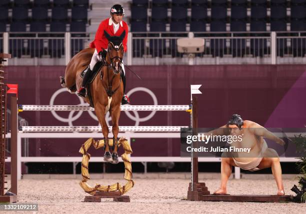 Daisuke Fukushima of Team Japan riding Chanyon competes during the Jumping Individual Qualifier on day eleven of the Tokyo 2020 Olympic Games at...