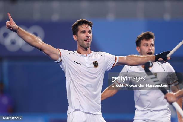 Lukas Windfeder of Team Germany celebrates after scoring their team's first goal during the Men's Semifinal match between Australia and Germany on...