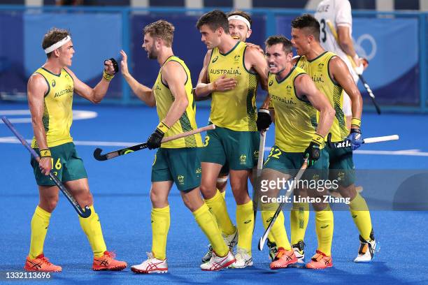 Blake Govers of Team Australia celebrates with teammates after scoring their team's second goal during the Men's Semifinal match between Australia...
