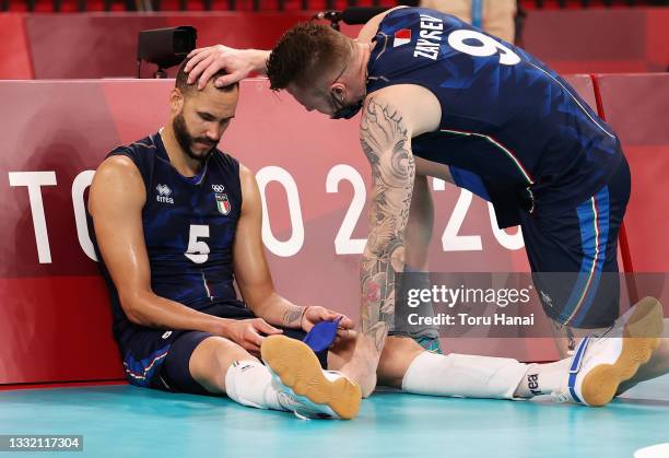 Osmany Juantorena and Ivan Zaytsev of Team Italy react after being defeated by Team Argentina during the Men's Quarterfinals volleyball on day eleven...
