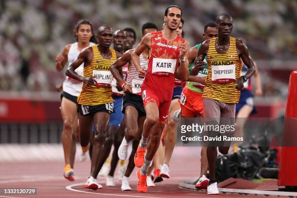 Mohamed Katir of Team Spain and Joshua Cheptegei of Team Uganda compete in the Men's 5000m heats on day eleven of the Tokyo 2020 Olympic Games at...