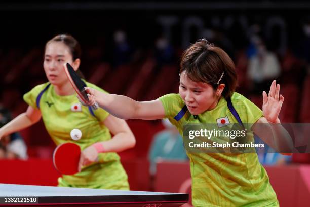 Ishikawa Kasumi and Hirano Miu of Team Japan in action during their Women's Team Semifinal table tennis match on day eleven of the Tokyo 2020 Olympic...