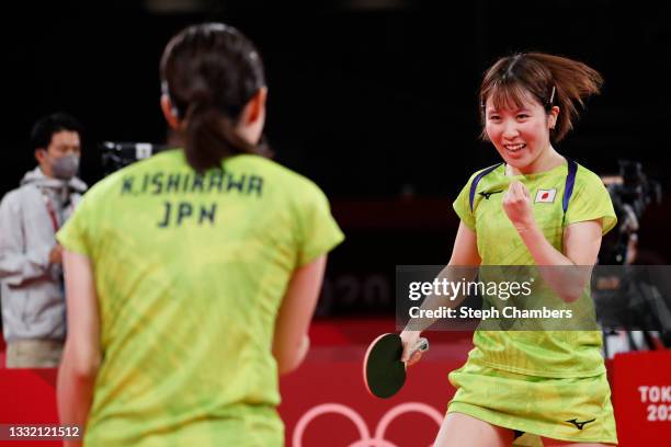 Ishikawa Kasumi and Hirano Miu of Team Japan react during their Women's Team Semifinal table tennis match on day eleven of the Tokyo 2020 Olympic...