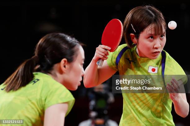 Ishikawa Kasumi and Hirano Miu of Team Japan in action during their Women's Team Semifinal table tennis match on day eleven of the Tokyo 2020 Olympic...