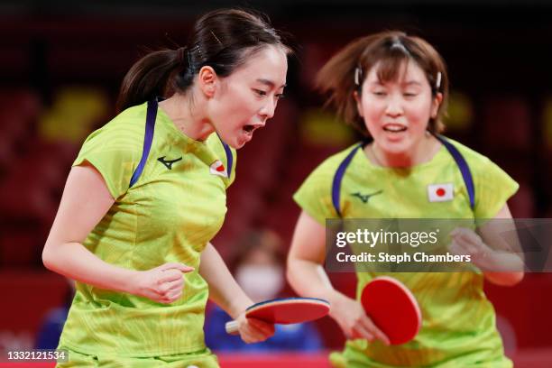 Ishikawa Kasumi and Hirano Miu of Team Japan react during their Women's Team Semifinal table tennis match on day eleven of the Tokyo 2020 Olympic...