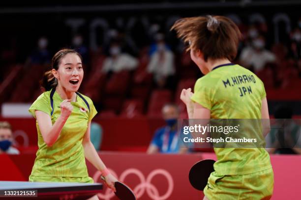 Ishikawa Kasumi and Hirano Miu of Team Japan react during their Women's Team Semifinal table tennis match on day eleven of the Tokyo 2020 Olympic...