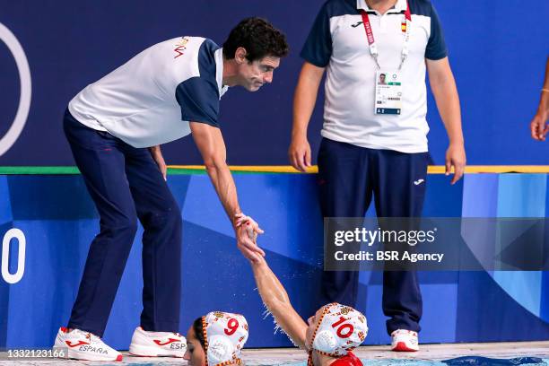 Judith Forca of Spain, Roser Tarrago of Spain, head coach Miki Oca of Spain during the Tokyo 2020 Olympic Waterpolo Tournament women's quarterfinal...