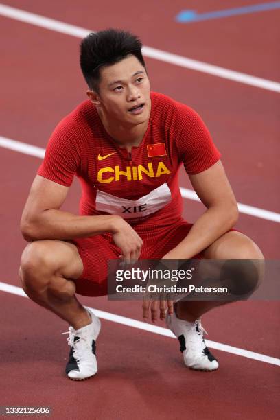 Zhenye Xie of Team China reacts competing in the Men's 200m Semi-Final on day eleven of the Tokyo 2020 Olympic Games at Olympic Stadium on August 03,...